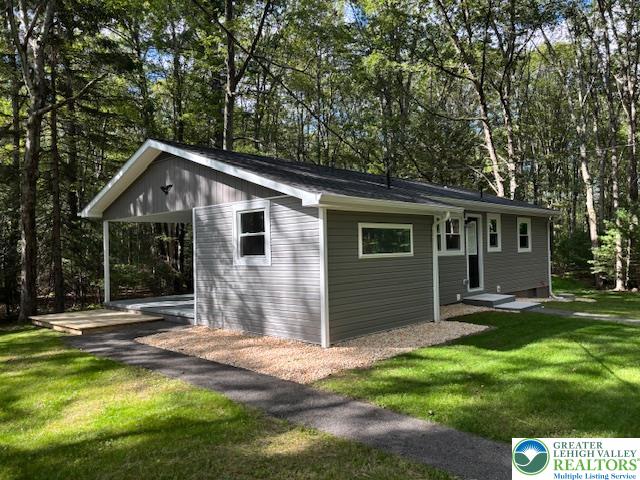 250 Bird Lane Kunkletown, PA 18058 - Photo 3 of 40 a front view of house with yard and green space