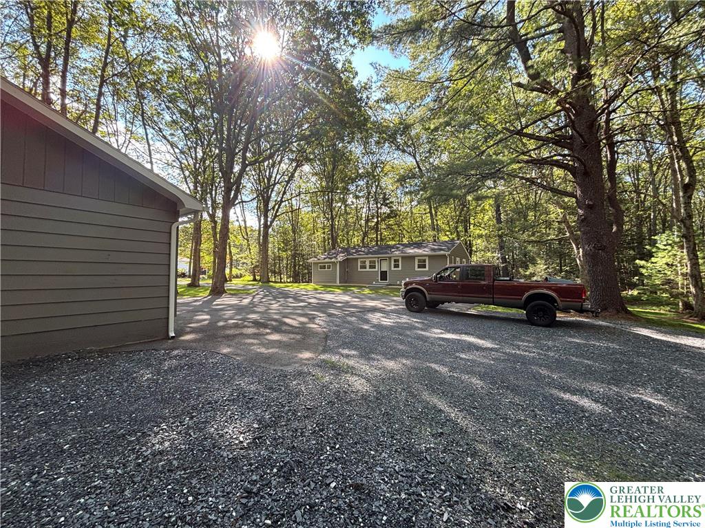 250 Bird Lane Kunkletown, PA 18058 - Photo 36 of 40 a view of a street with a parked car