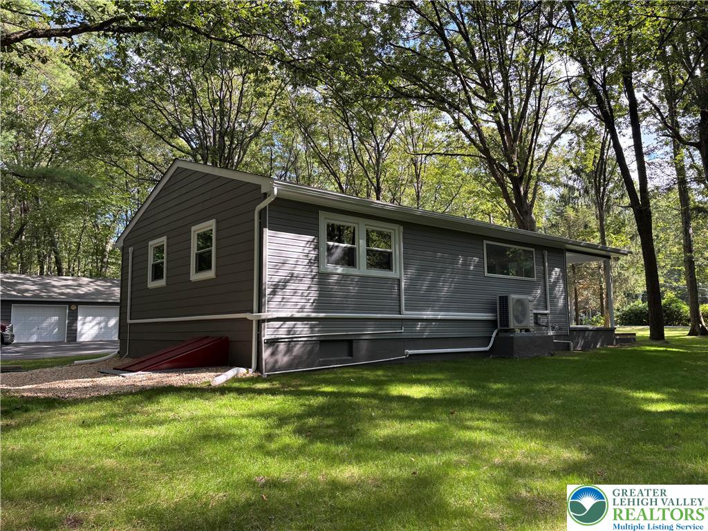 250 Bird Lane Kunkletown, PA 18058 - Photo 39 of 40 a front view of a house with a garden