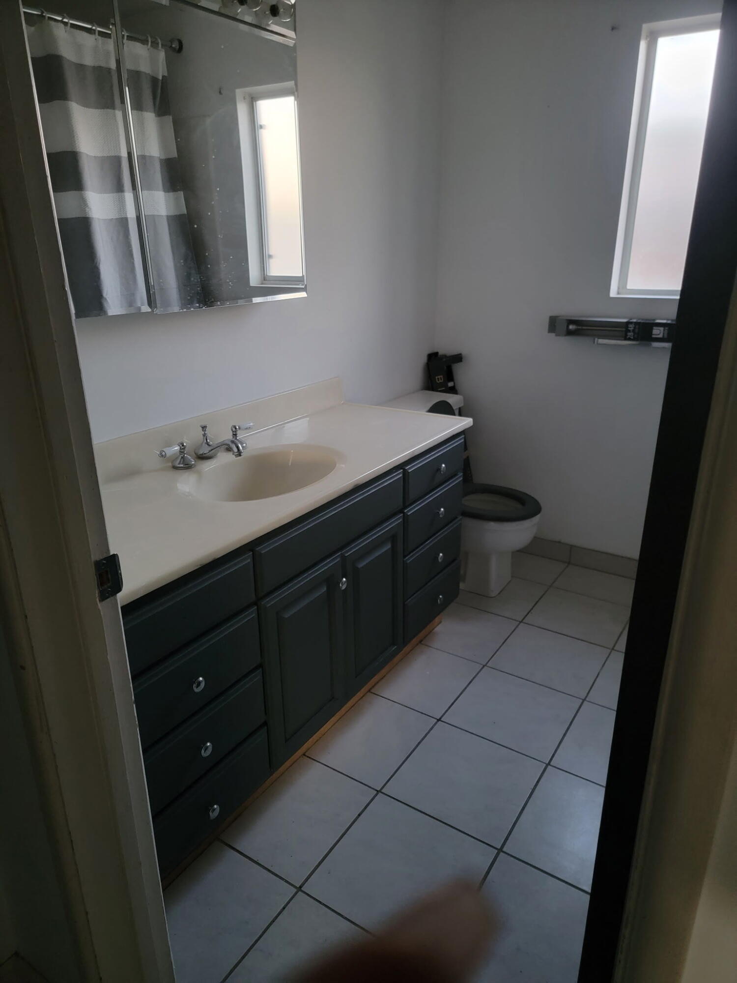66630 San Marcus Road Desert Hot Springs, CA 92240 - Photo 3 of 5 a bathroom with a sink and a mirror