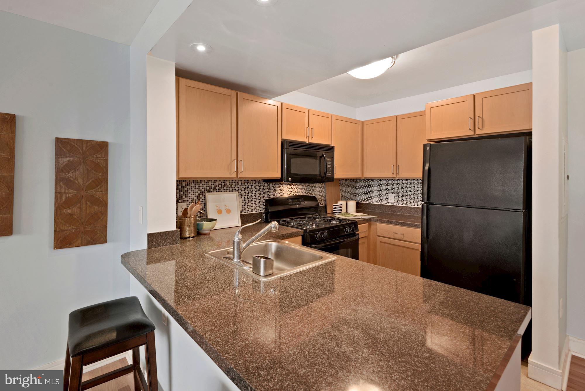 800 4th Street Southwest, Unit S210 Washington, DC 20024 - Photo 9 of 41 kitchen island