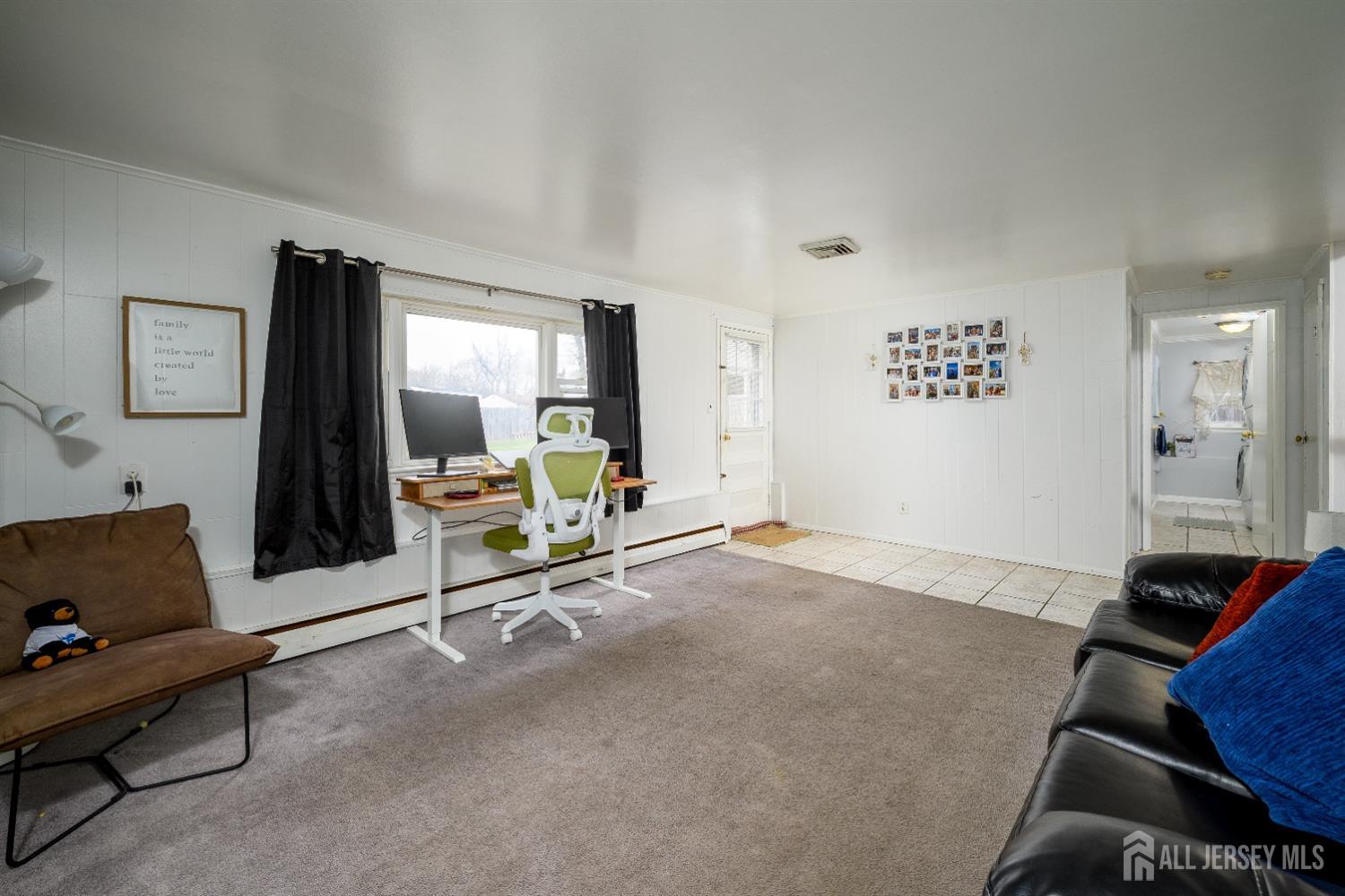 109 Hickory Road Colonia, NJ 07067 - Photo 20 of 34 a room with furniture and air hockey table