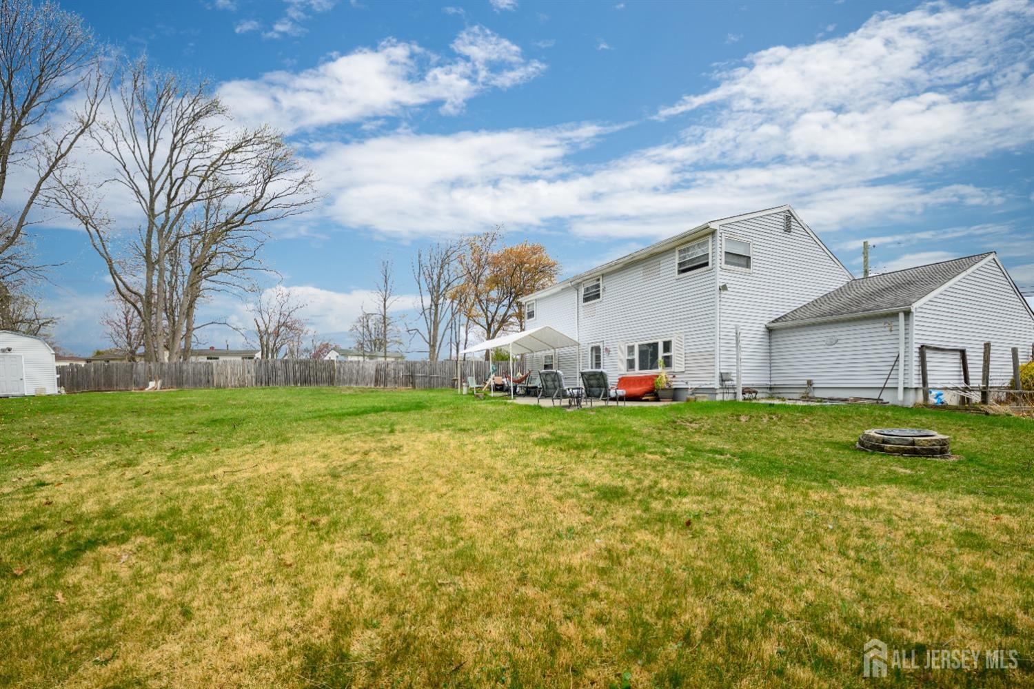 109 Hickory Road Colonia, NJ 07067 - Photo 2 of 34 a front view of house with yard and entertaining space