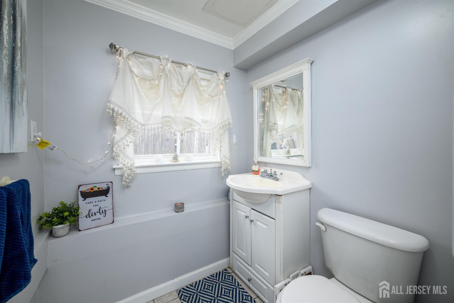 109 Hickory Road Colonia, NJ 07067 - Photo 25 of 34 a bathroom with a sink toilet and shower