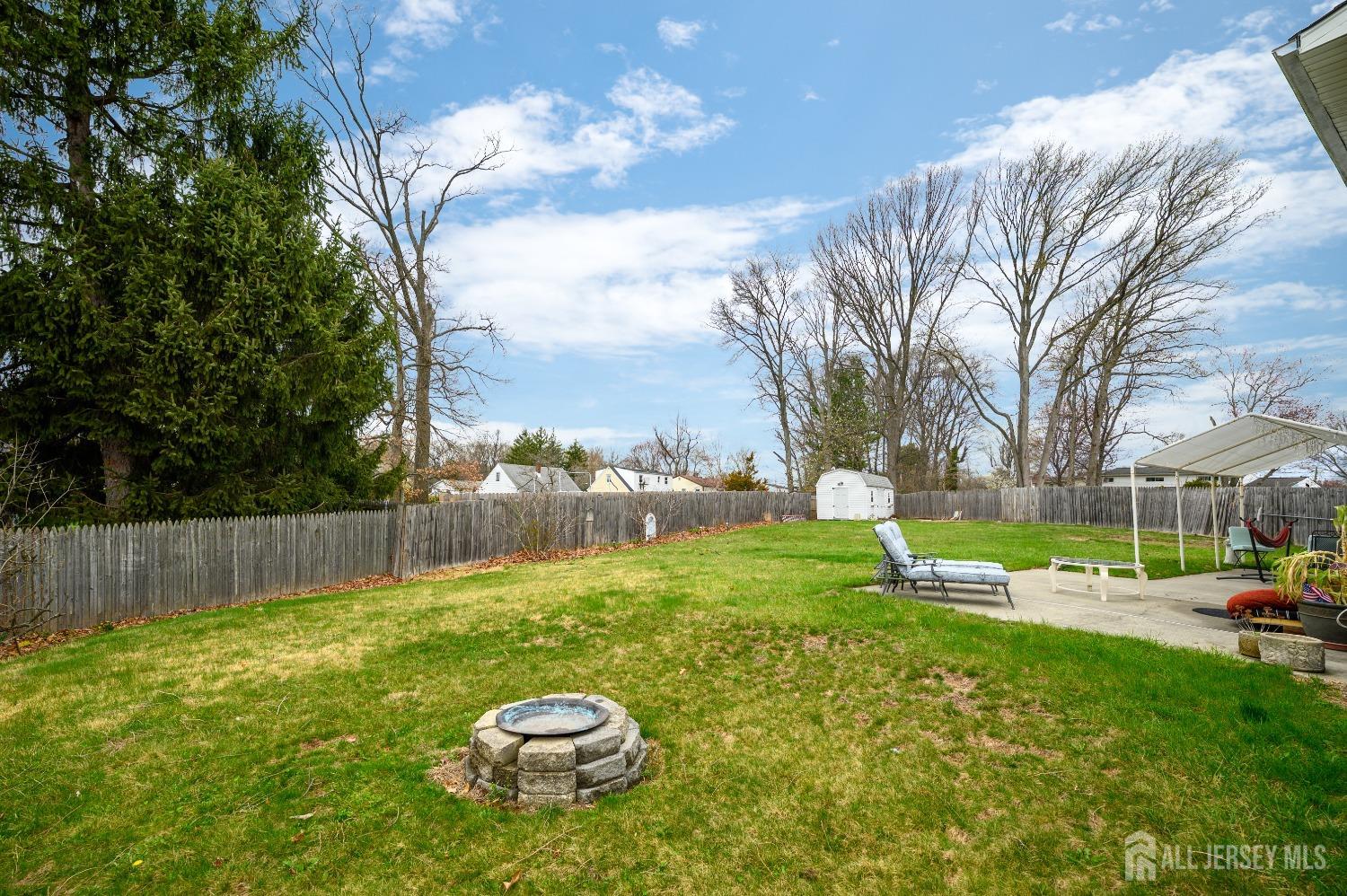 109 Hickory Road Colonia, NJ 07067 - Photo 30 of 34 a view of a backyard with a garden