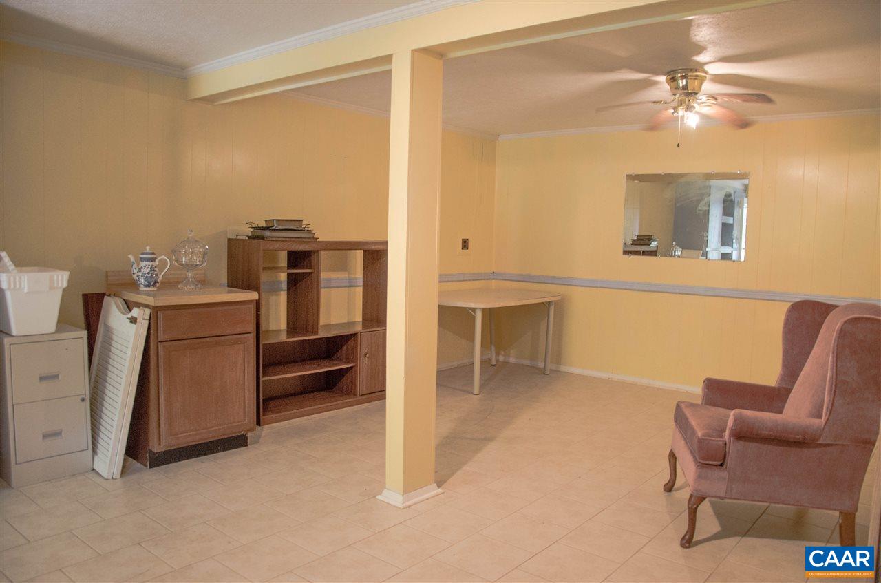 230 Ridge Street Lovingston, VA 22949 - Photo 26 of 37 a view of kitchen with furniture and a refrigerator