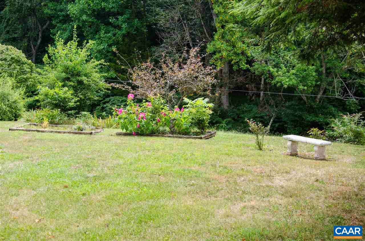 230 Ridge Street Lovingston, VA 22949 - Photo 34 of 37 a backyard of a house with lots of green space