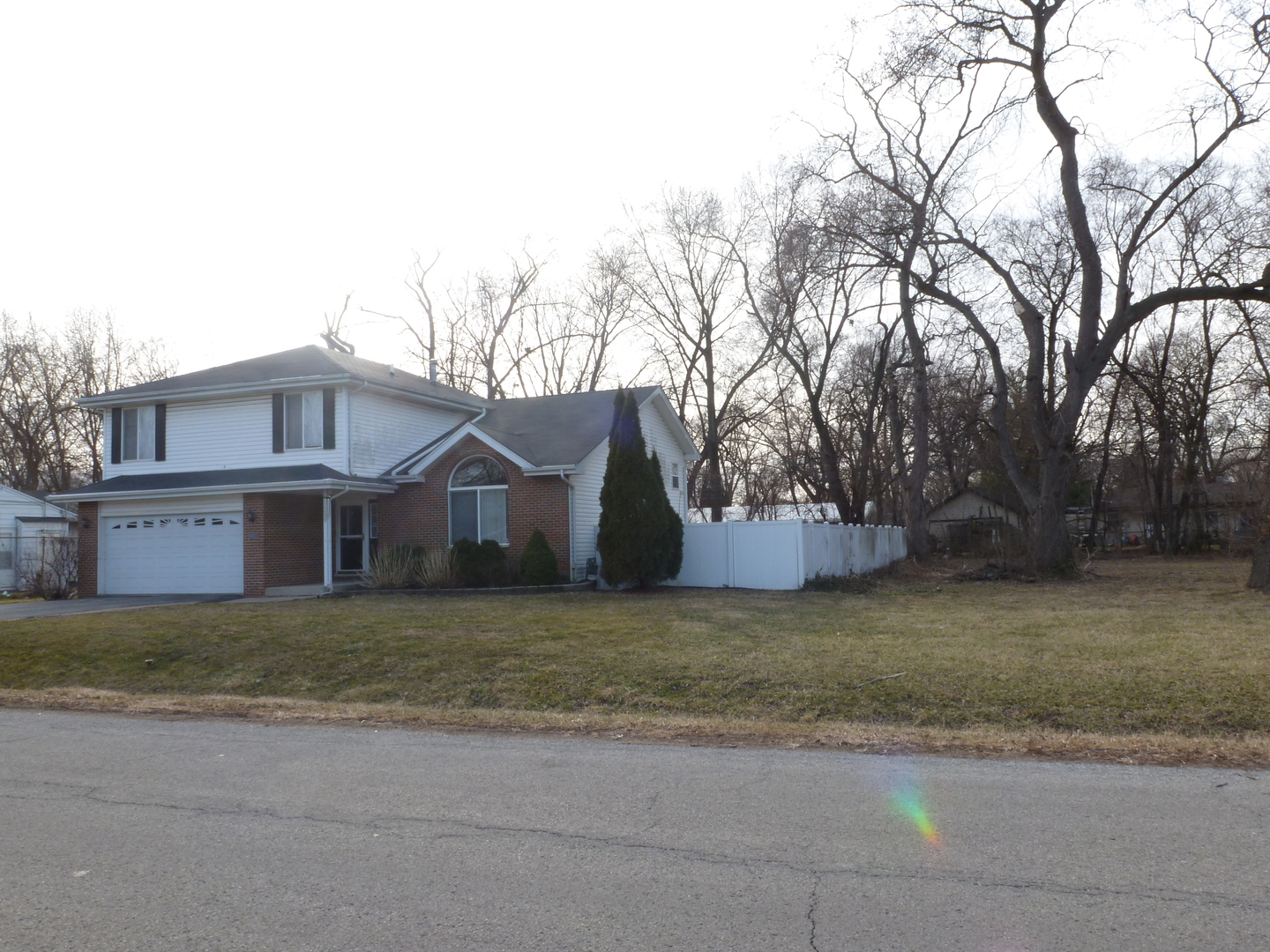 16212 Trumbull Avenue Markham, IL 60428 - Photo 2 of 36 a view of a house with a yard