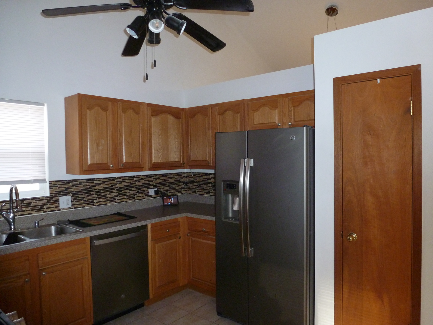 16212 Trumbull Avenue Markham, IL 60428 - Photo 28 of 36 a kitchen with stainless steel appliances granite countertop a refrigerator and a sink