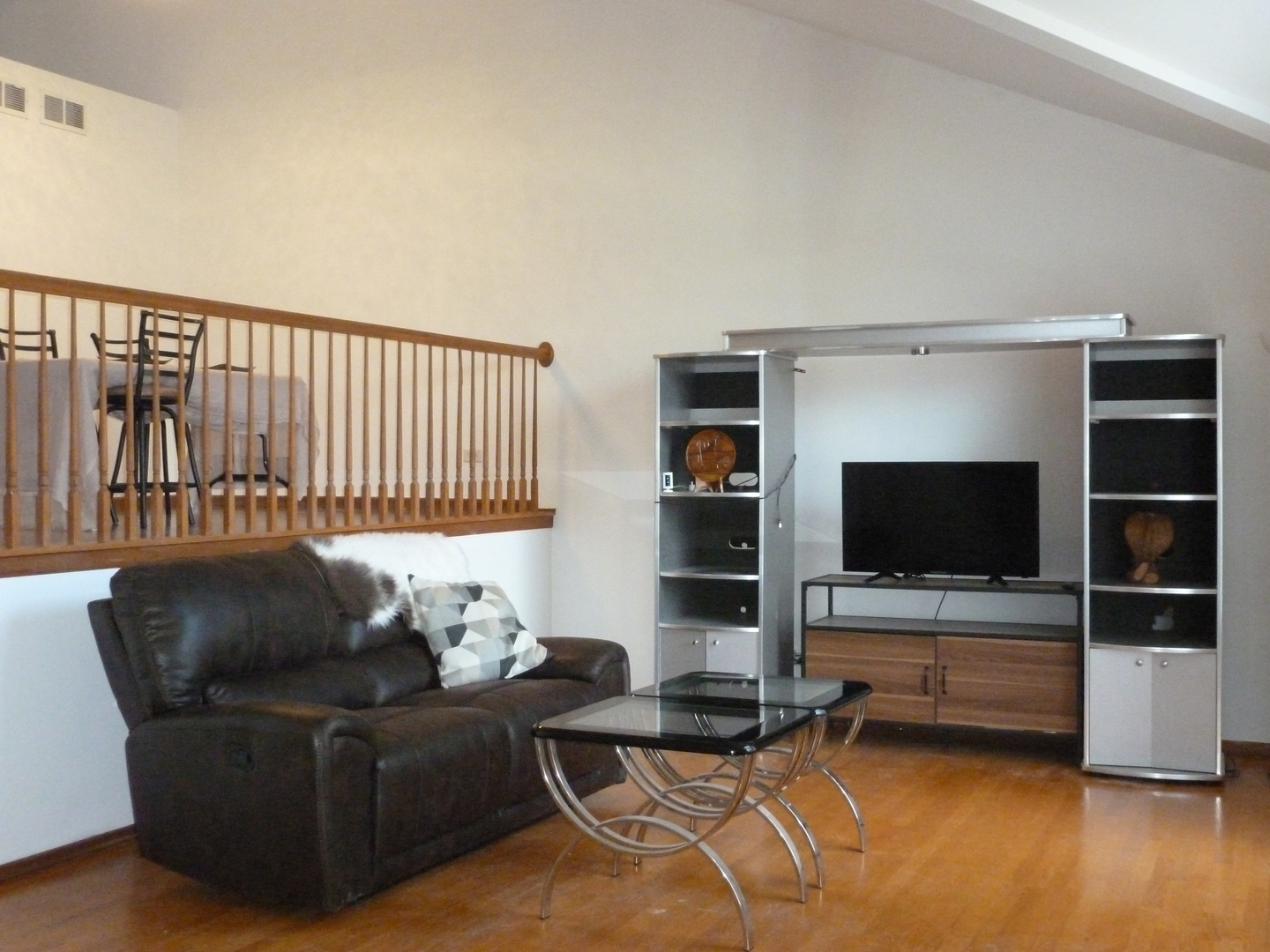 16212 Trumbull Avenue Markham, IL 60428 - Photo 5 of 36 a living room with furniture and a flat screen tv