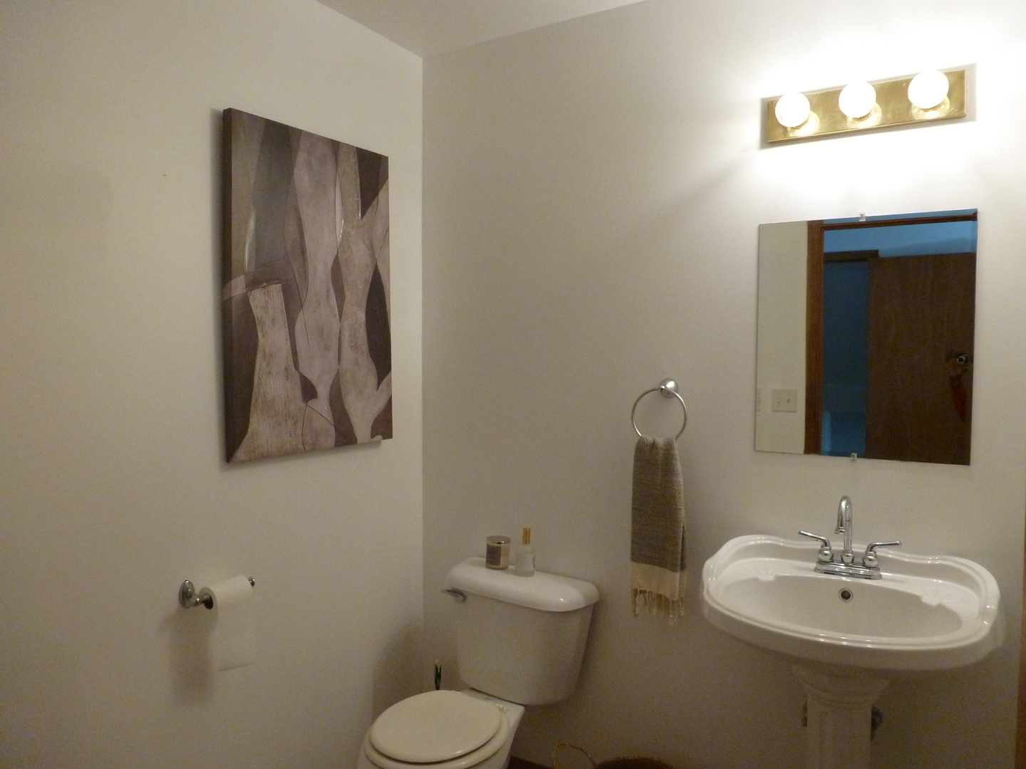16212 Trumbull Avenue Markham, IL 60428 - Photo 6 of 36 a bathroom with a toilet sink and mirror