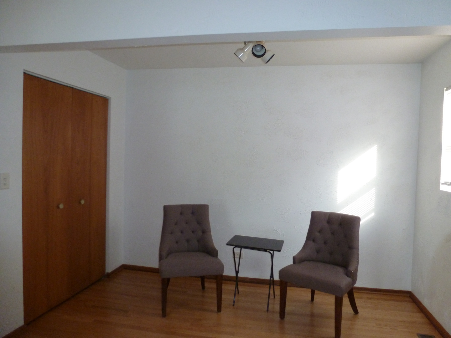 16212 Trumbull Avenue Markham, IL 60428 - Photo 9 of 36 a chair and a table in a room
