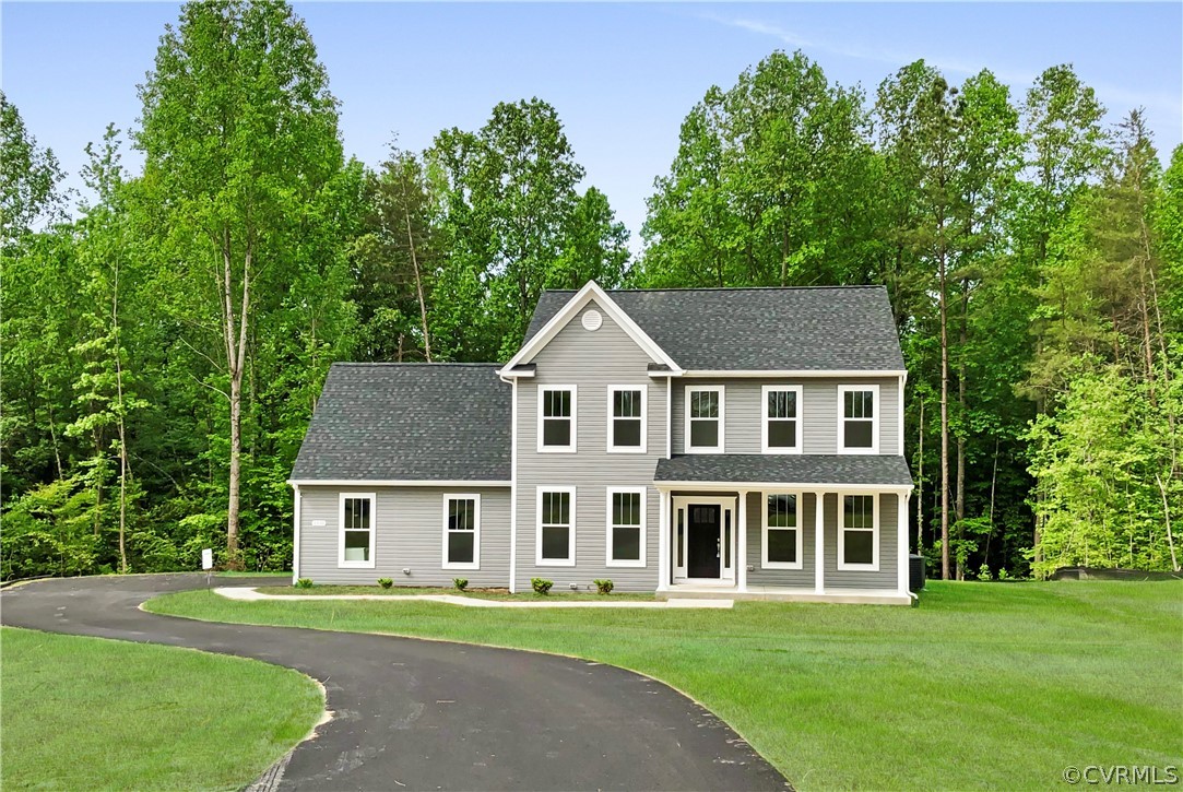 front view of a house with a yard
