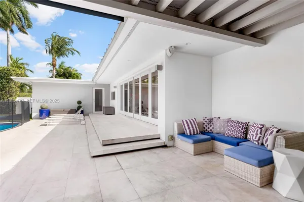 a house view with a backyard space