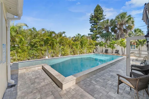 a view of a house with swimming pool