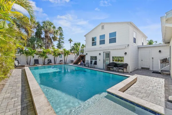 a view of a house with swimming pool
