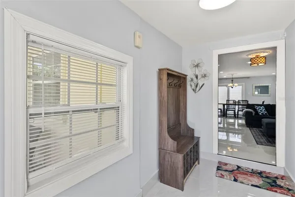 a view of a bedroom with a furniture and closet
