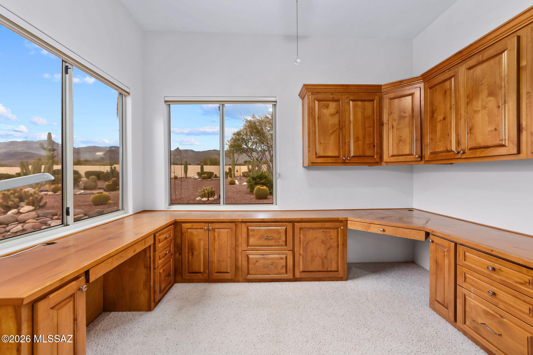 3655 North Harrison Road Tucson, AZ 85749 - Photo 33 of 51 a large kitchen with stainless steel appliances granite countertop a sink and cabinets