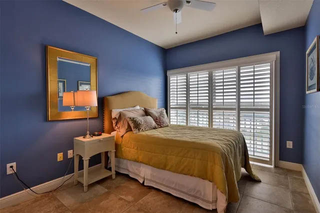 a bedroom with a bed and dresser