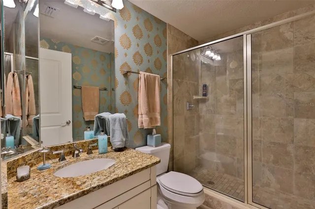 a room with furniture and wooden floor