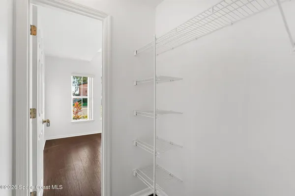 a view of swimming pool with seating area and furniture