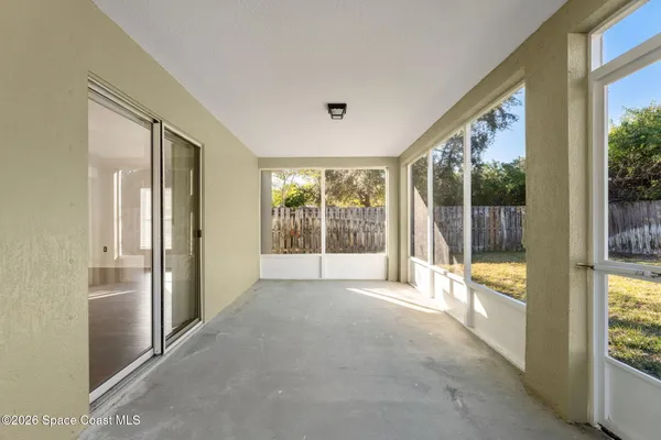 an aerial view of residential building and lake