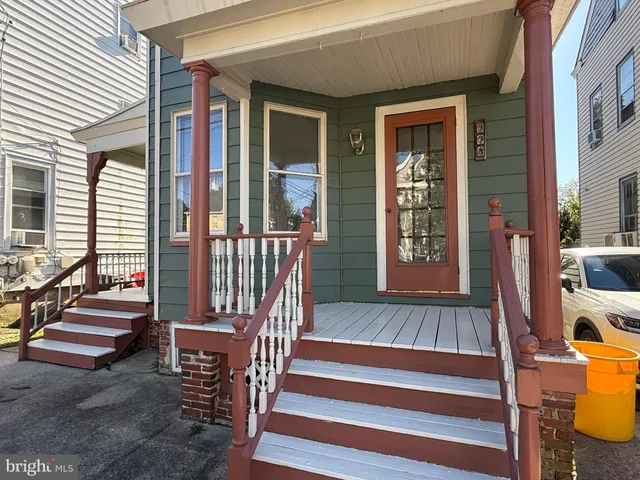 a view of front door with stairs