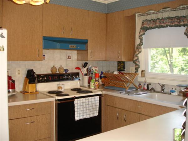 26 Fomer Road Southampton, MA 01073 - Photo 11 of 29 a kitchen with a sink stove and cabinets