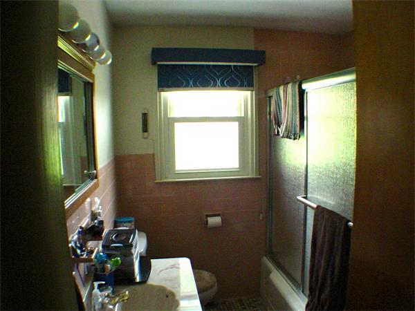 26 Fomer Road Southampton, MA 01073 - Photo 19 of 29 a bathroom with a window a sink and a mirror
