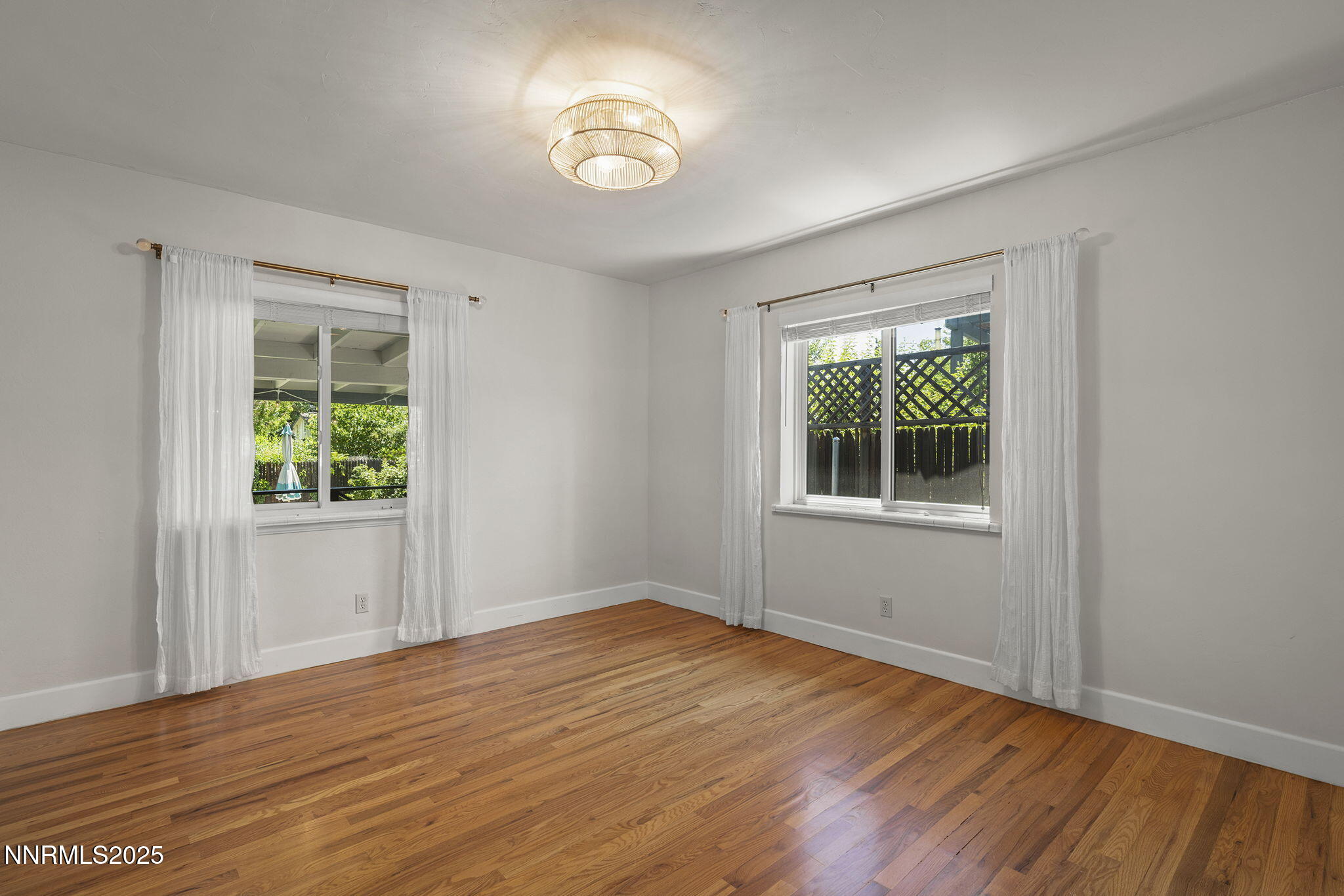2330 Sunrise Drive Reno, NV 89509 - Photo 30 of 48 a view of empty room with window and wooden floor