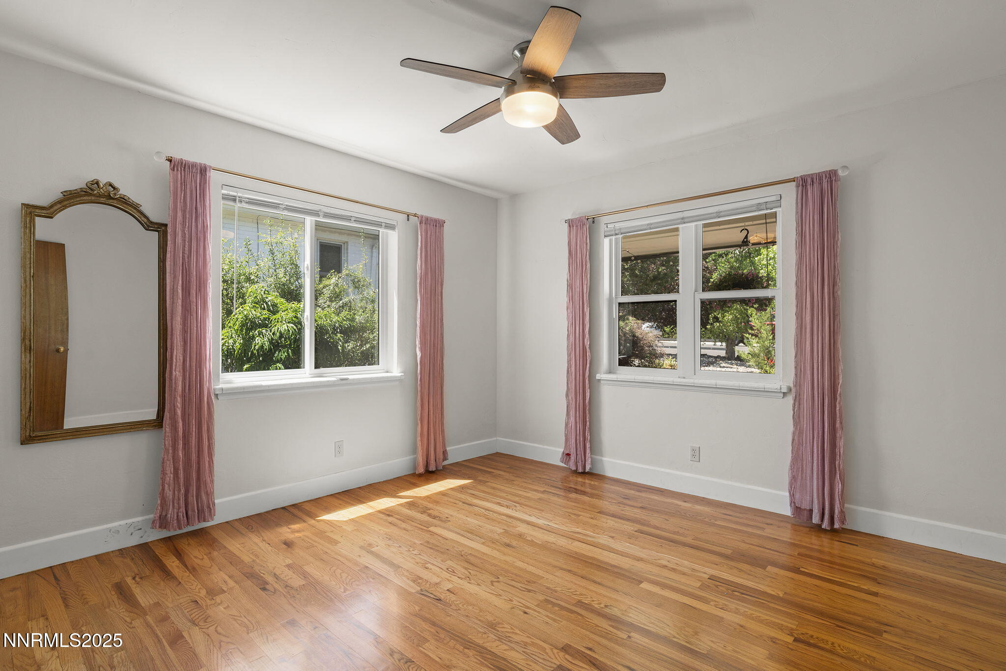 2330 Sunrise Drive Reno, NV 89509 - Photo 31 of 48 a view of empty room with wooden floor and fan