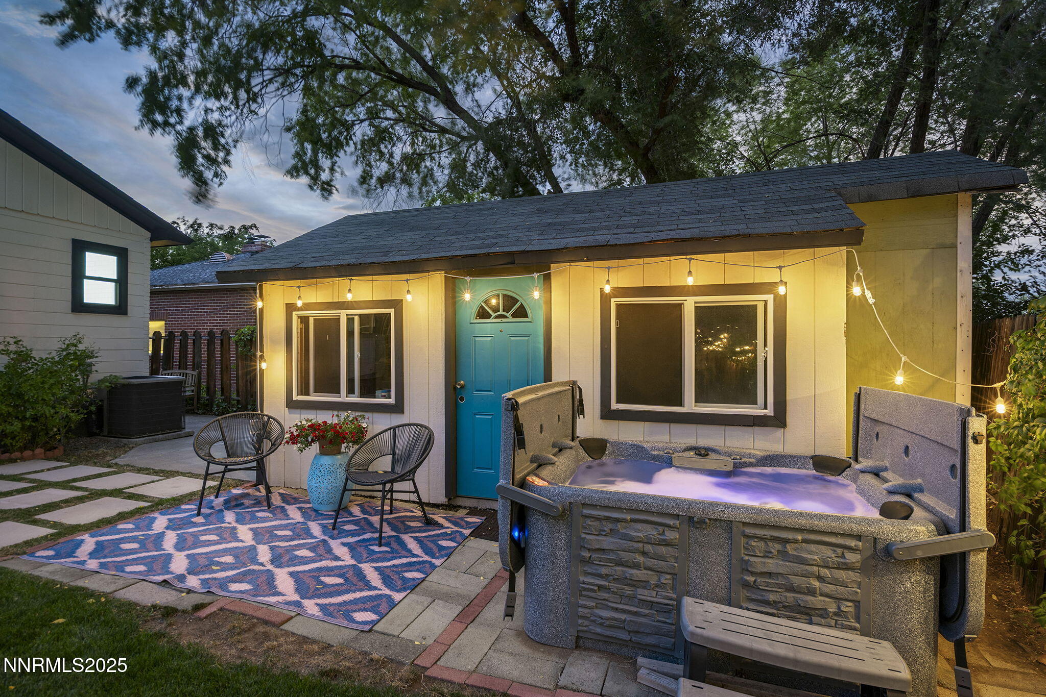2330 Sunrise Drive Reno, NV 89509 - Photo 41 of 48 a view of a patio with table and chairs and potted plants