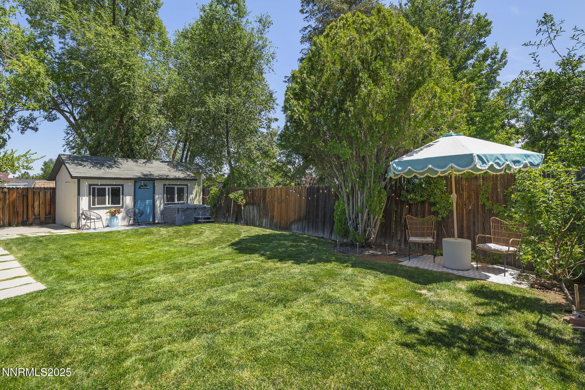 2330 Sunrise Drive Reno, NV 89509 - Photo 43 of 48 a backyard of a house with seating space