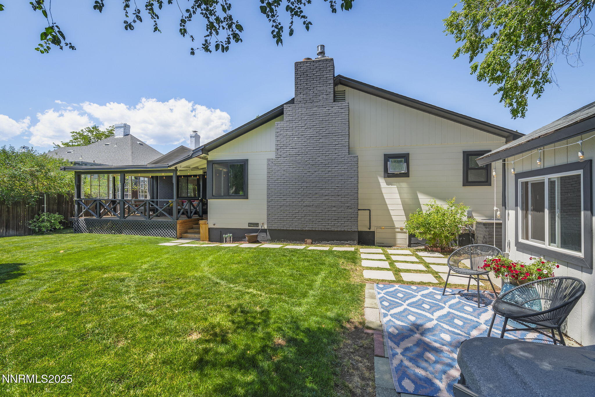 2330 Sunrise Drive Reno, NV 89509 - Photo 45 of 48 a view of a house with backyard sitting area and garden