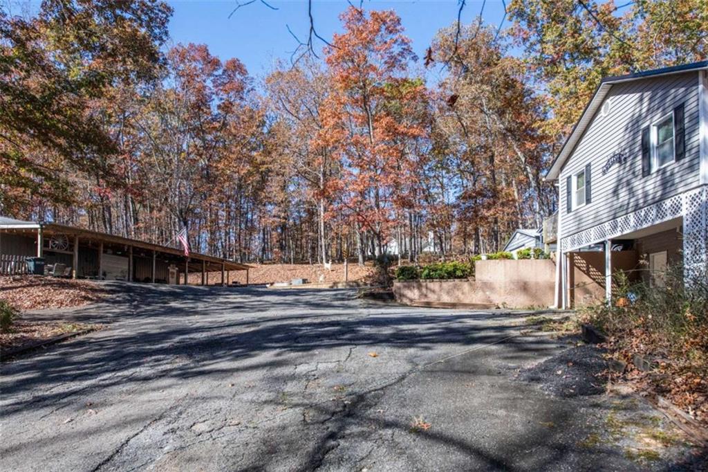 261 Clayton Trail Canton, GA 30114 - Photo 27 of 37 a view of a backyard with large trees