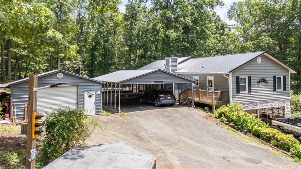 261 Clayton Trail Canton, GA 30114 - Photo 28 of 37 a house with trees in the background