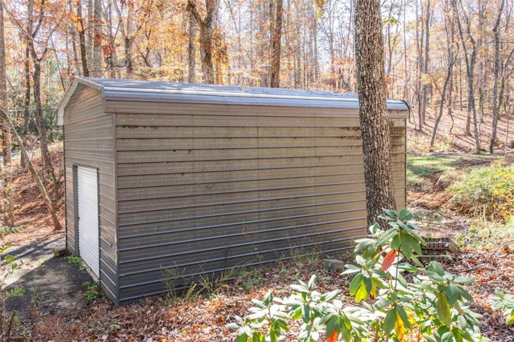 261 Clayton Trail Canton, GA 30114 - Photo 30 of 37 a view of a pathway of a yard