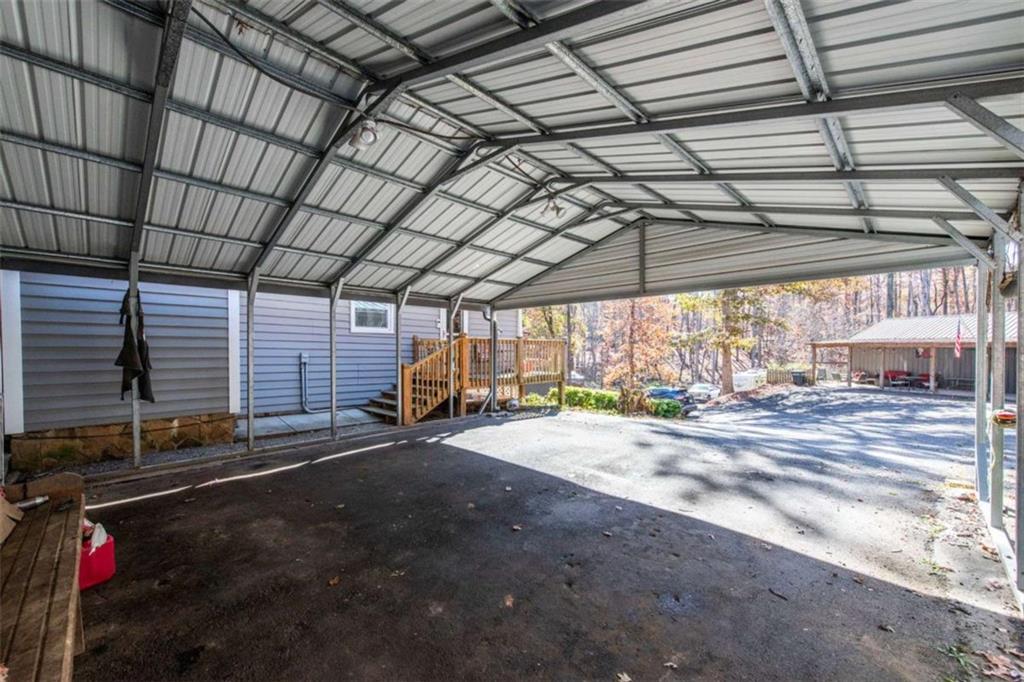 261 Clayton Trail Canton, GA 30114 - Photo 31 of 37 a view of a garage with wooden floor