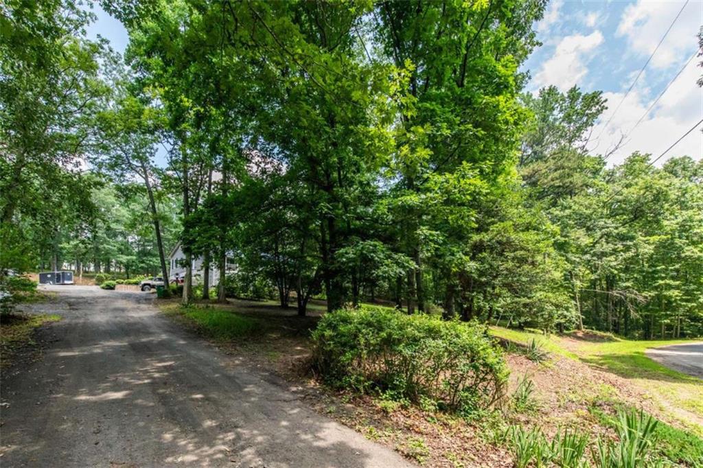 261 Clayton Trail Canton, GA 30114 - Photo 37 of 37 a view of a street with a trees