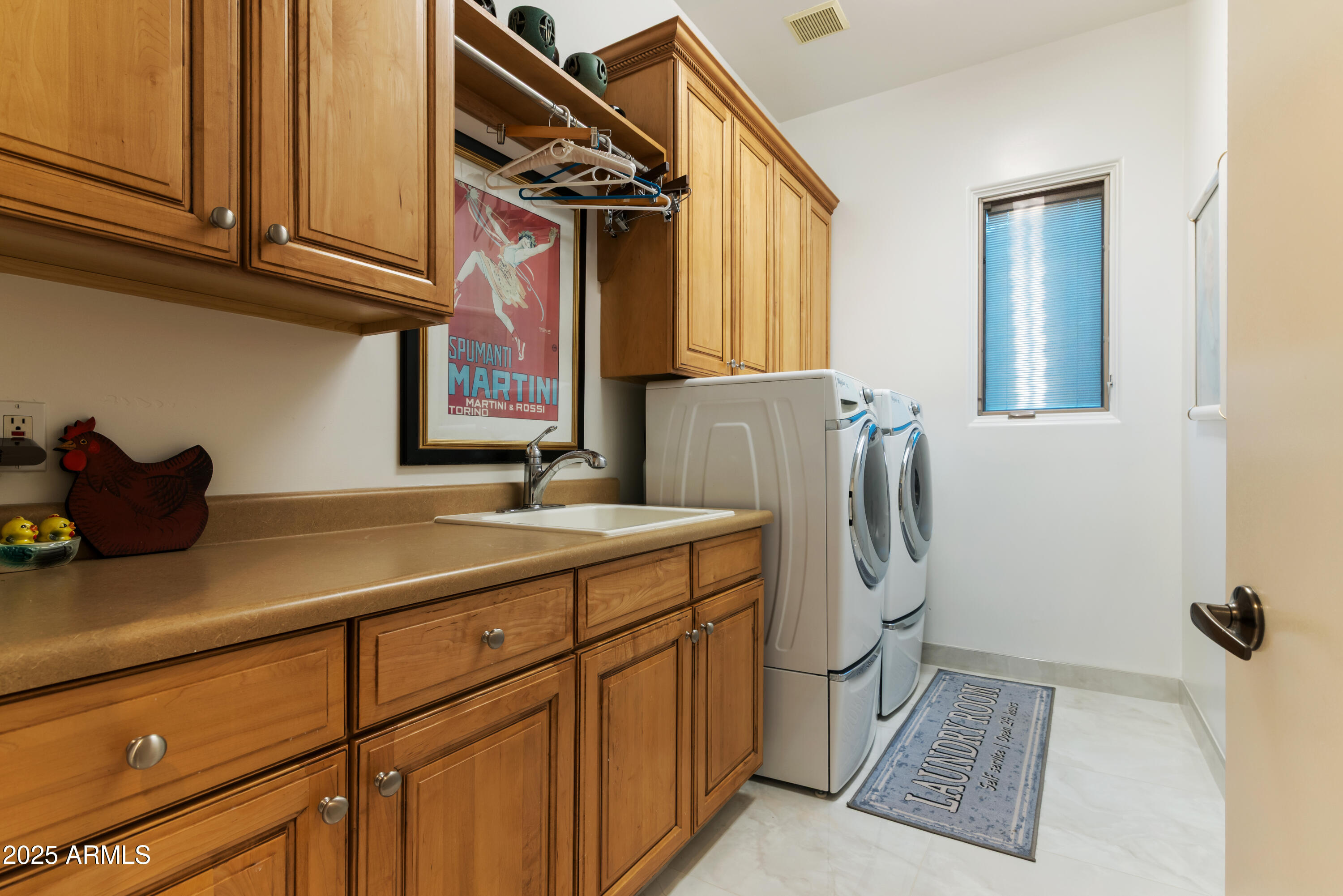 14437 East Wethersfield Road Scottsdale, AZ 85259 - Photo 23 of 36 Laundry Room with Counter Space to Fold