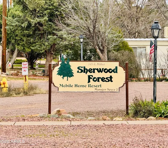 a sign on the side of the road