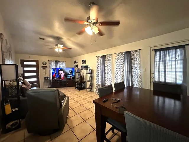 a kitchen that has a sink and a stove in it