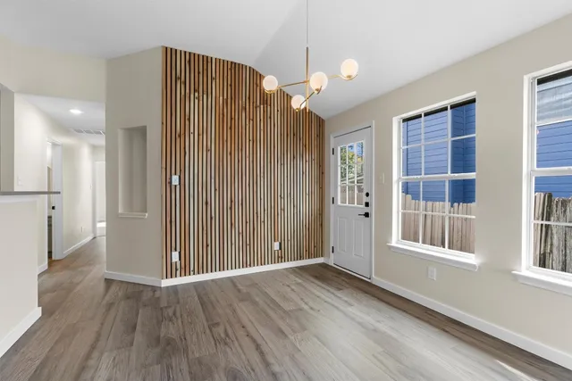 a kitchen with a stove and a sink