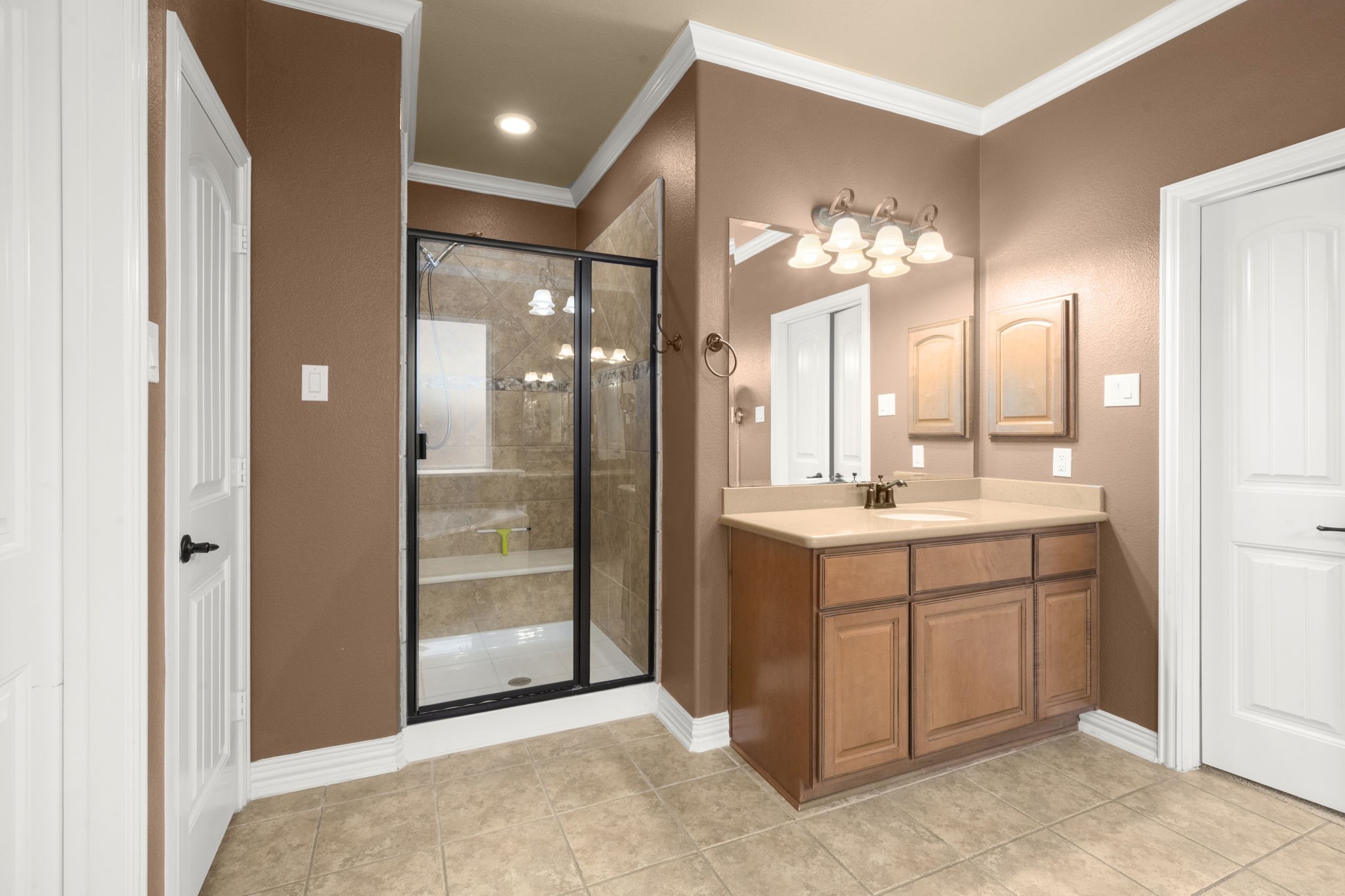 110 David Forest Lane Conroe, TX 77384 - Photo 32 of 35 a bathroom with a double vanity sink mirror and shower