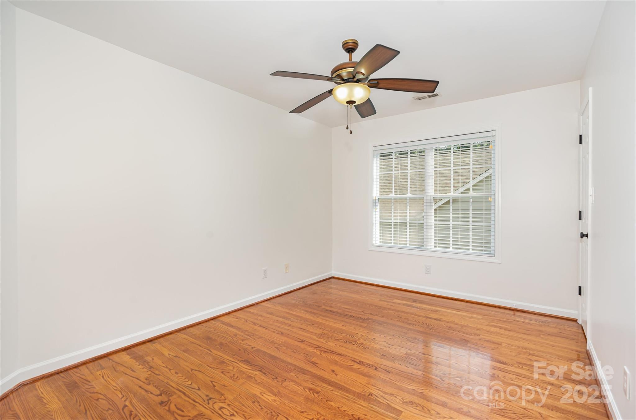 2746 Cameron Commons Way Matthews, NC 28104 - Photo 24 of 38 a view of an empty room with a window