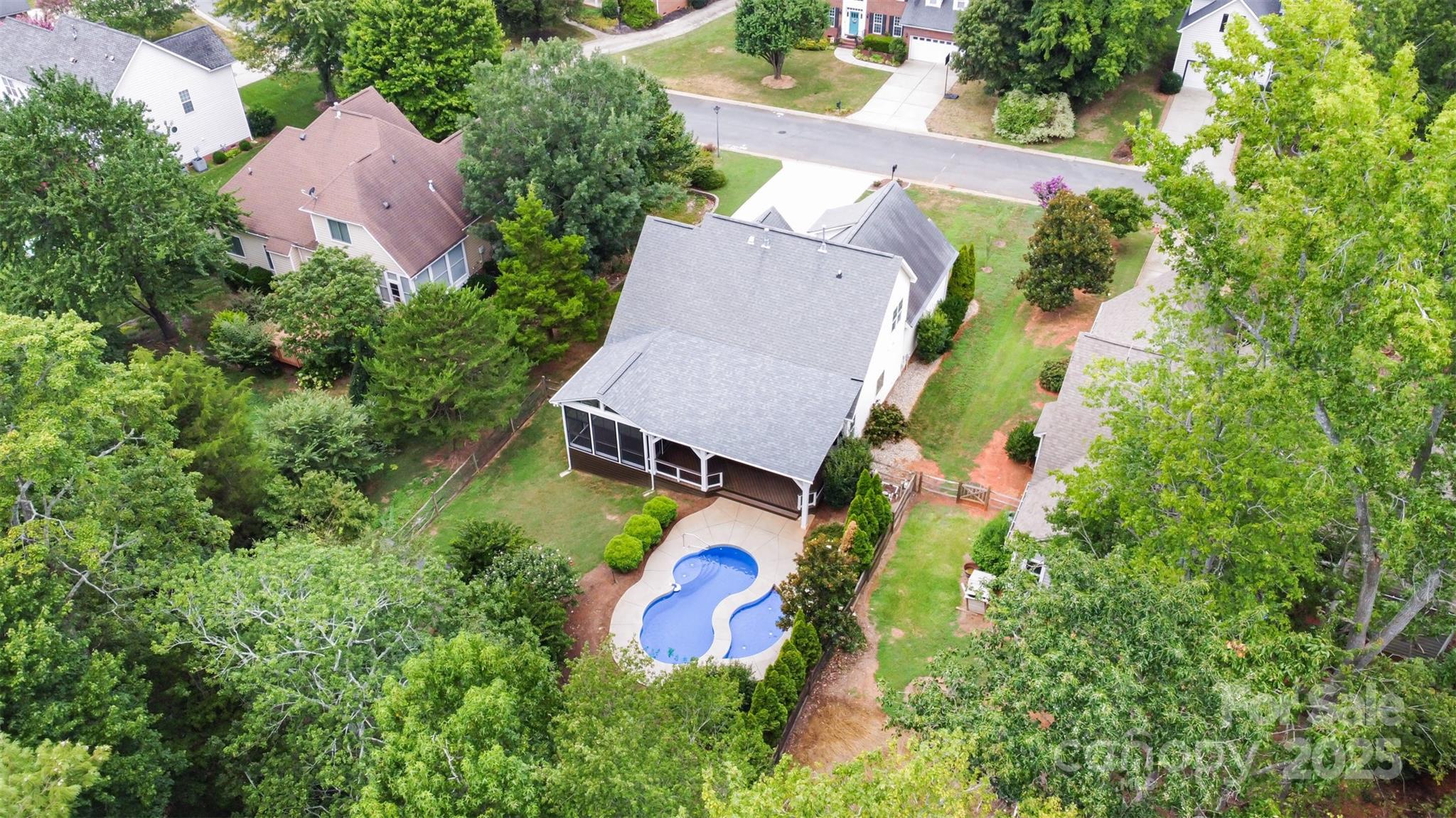 2746 Cameron Commons Way Matthews, NC 28104 - Photo 5 of 38 an aerial view of house with yard swimming pool and outdoor seating
