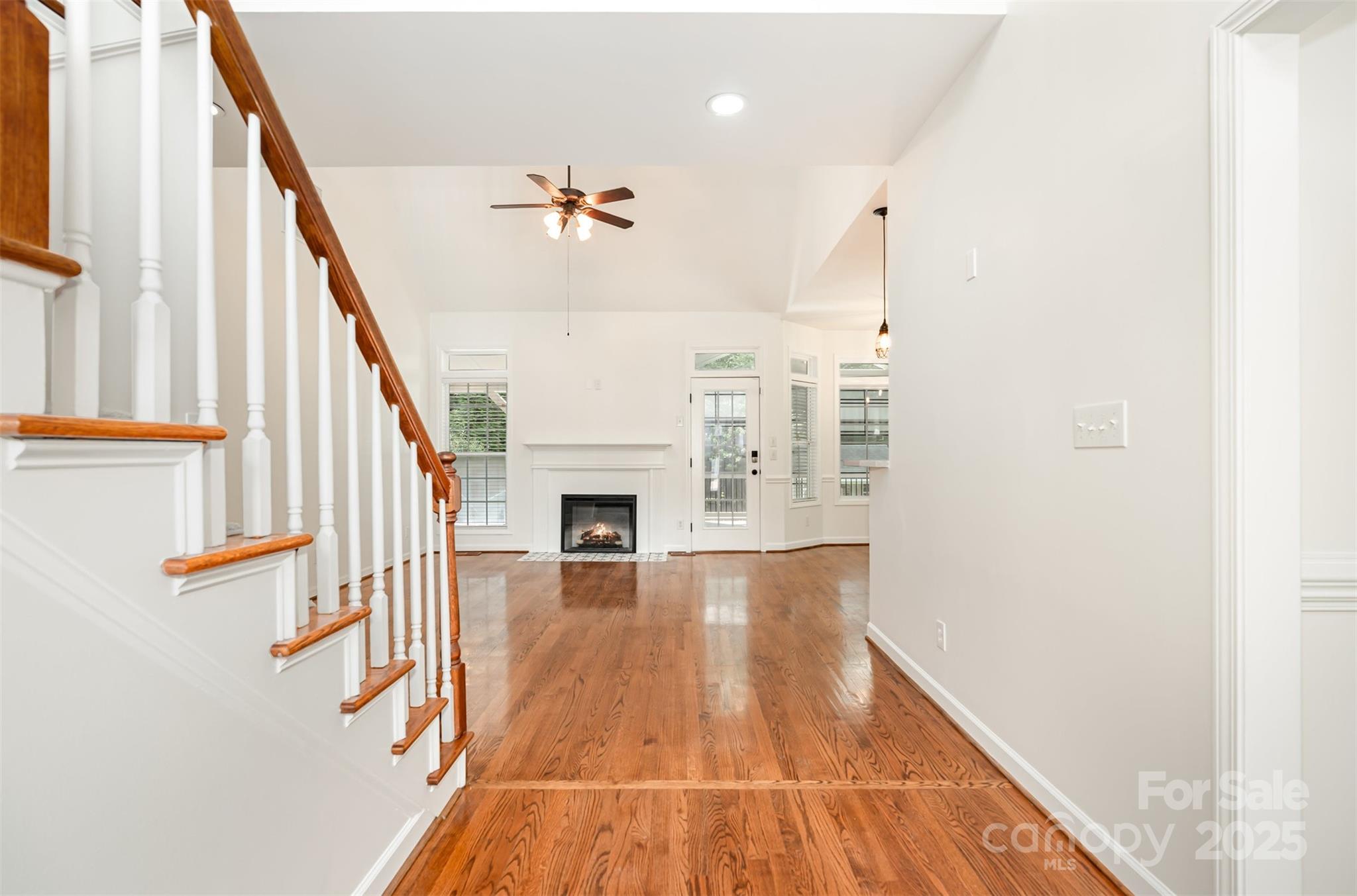 2746 Cameron Commons Way Matthews, NC 28104 - Photo 6 of 38 a view of entryway and hall with wooden floor