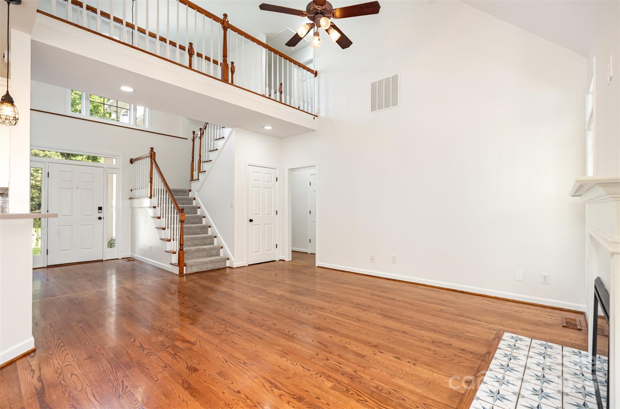 2746 Cameron Commons Way Matthews, NC 28104 - Photo 8 of 38 a view of an entryway with wooden floor