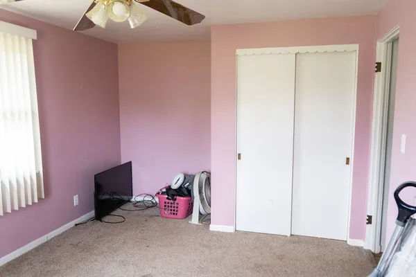 a view of a room with a window