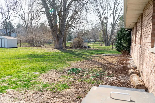 a garden view with a seating space